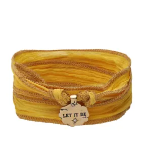 Silk tie bracelet with bronze and diamond Let It Be charm by Catherine Michiels - Jane de Boy.