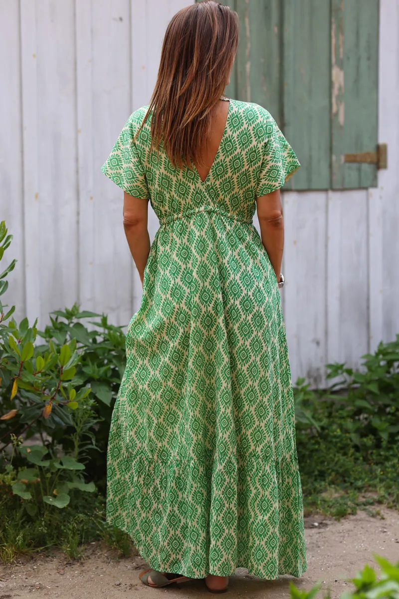 Cotton halter maxi dress with waist tie and green eye sun pattern