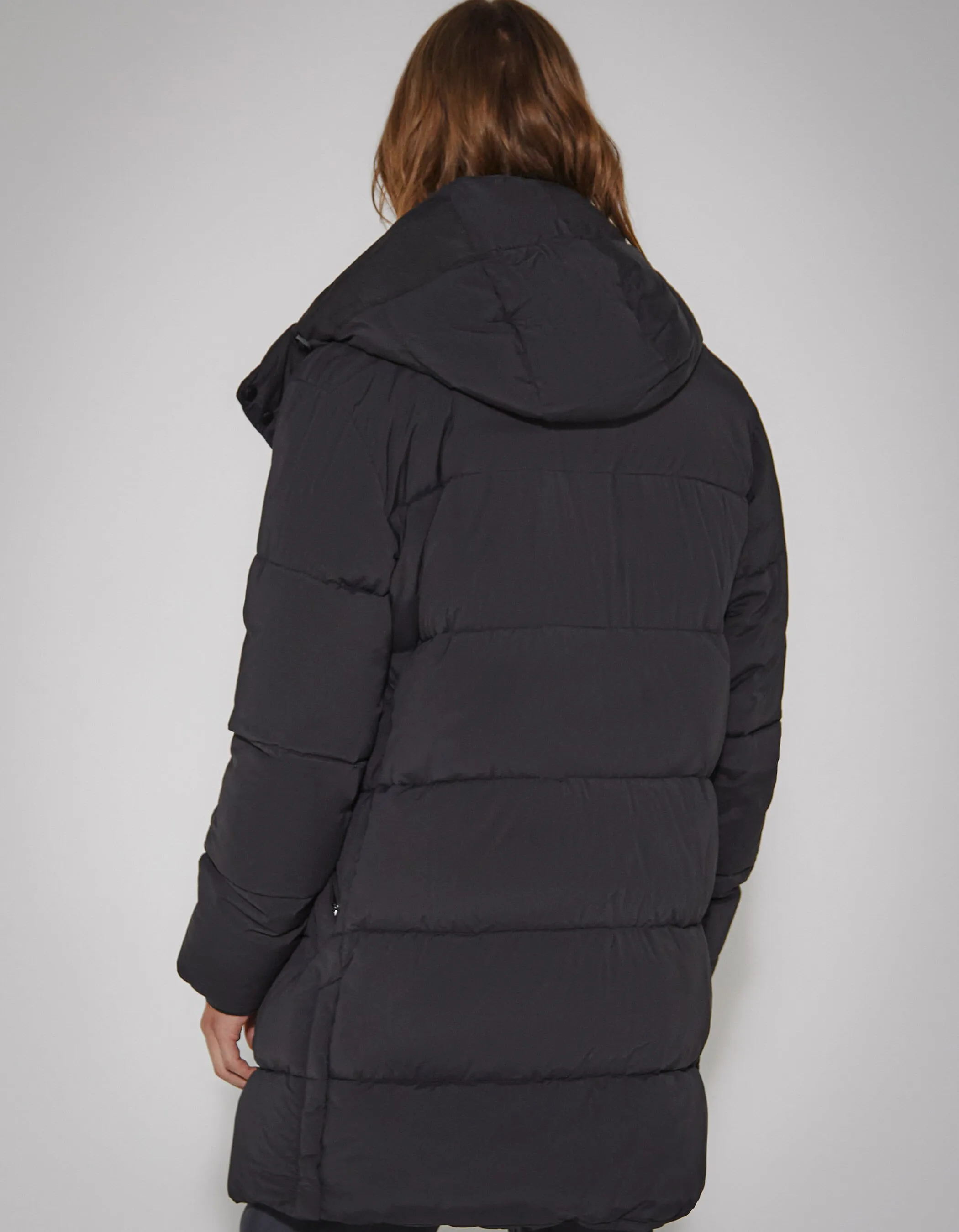 Long black quilted men's coat