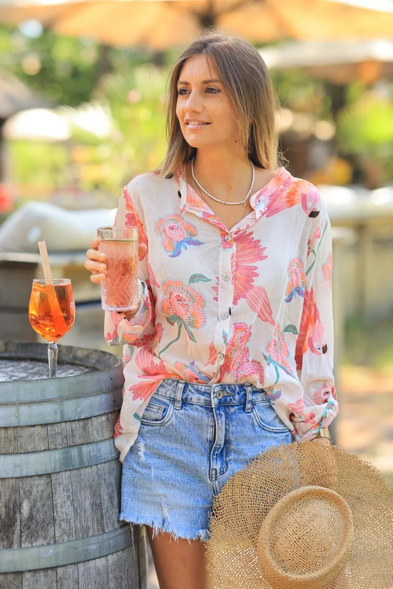 Light ecru cotton voile shirt with colorful flower and parrot motifs.